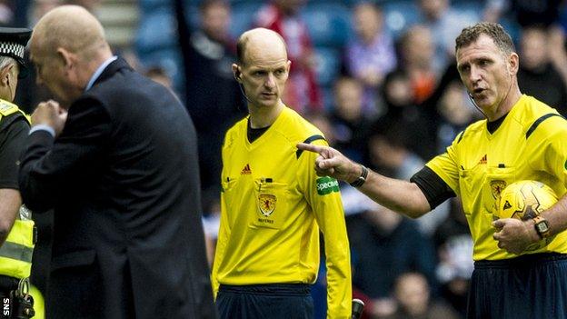 Peter Houston and referee John McKendrick