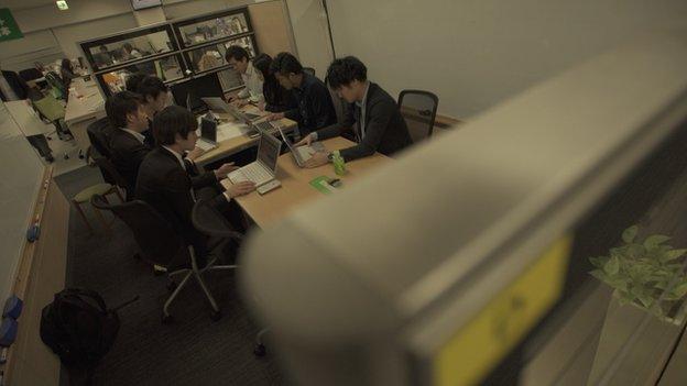 CyberAgent staff in a meeting in Tokyo office