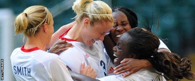 Steph Houghton is surrounded by Team GB team-mates after scoring against New Zealand