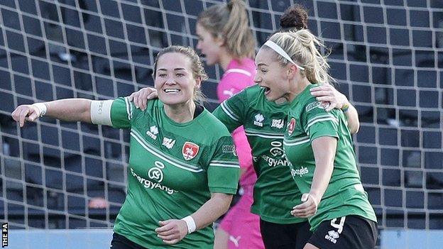 Katie Wilkinson celebrates after scoring against Crystal Palace