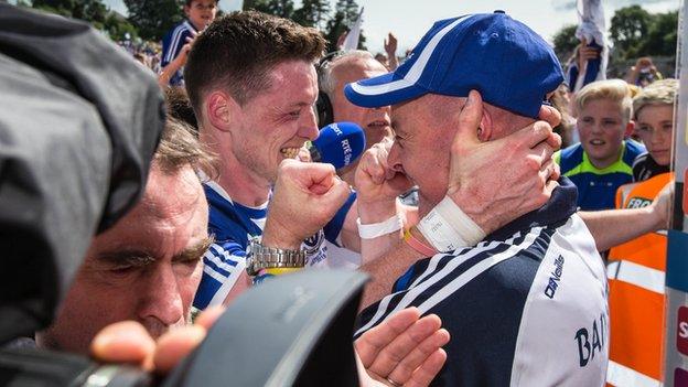 Conor McManus celebrates with manager Malachy O'Rourke after Monaghan's Ulster Final triumph