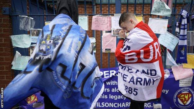 Bury fans gathered at their Gigg Lane home after they were expelled from the English Football League, but 12 months later, they are are no nearer to seeing a return to the ground