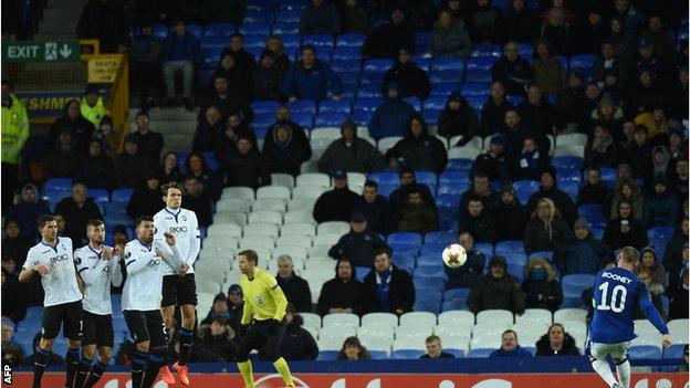 Everton captain Wayne Rooney takes a free-kick against Atalanta