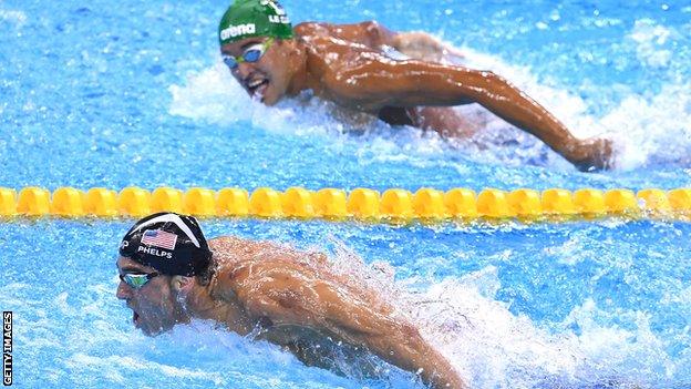 Chad le Clos looks on as Phelps avenges his defeat by him at London 2012