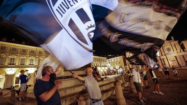 Juventus fans celebrate their title win in Turin