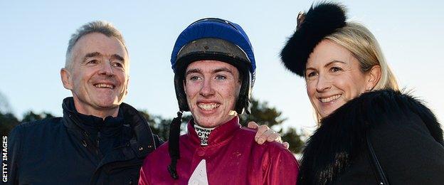 Jack Kennedy (centre) with winning owner Michael O'Leary (right) and the Ryanair boss' wife Anita