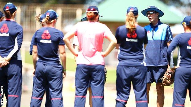 England women coach Mark Robinson speaks to the players