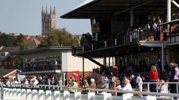 Racegoers at Warwick Racecourse