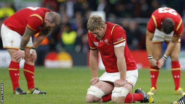 Wales players in despair after their quarter final defeat by South Africa in 2015