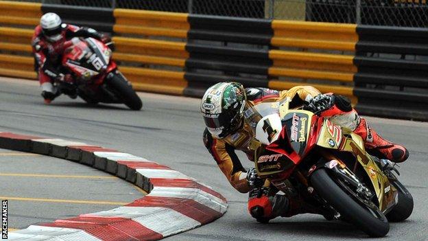 Eventual race winner Peter Hickman leads NI's Glenn Irwin during the 12-lap race at Macau