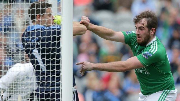 Sean Quigley pushes Stephen Cluxton over the Dublin goal-line