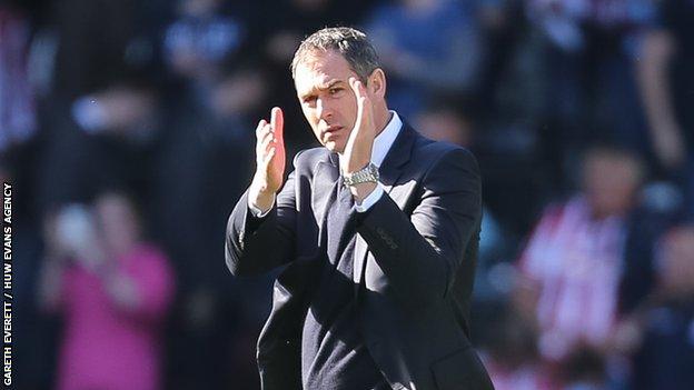 Paul Clement applauds the supporters after last season's 2-0 home win against Stoke City.