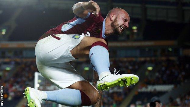 Alan Hutton celebrates his goal for Aston Villa