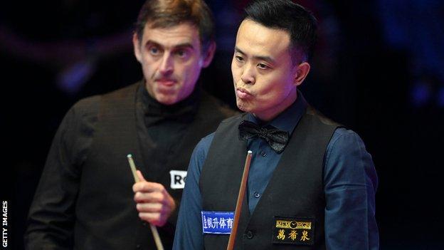 Ronnie O'Sullivan and Marco Fu