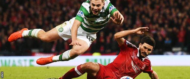 Celtic's James Forrest is brought down by Aberdeen's Anthony O'Connor