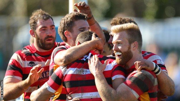 Cornish Pirates celebrate a try