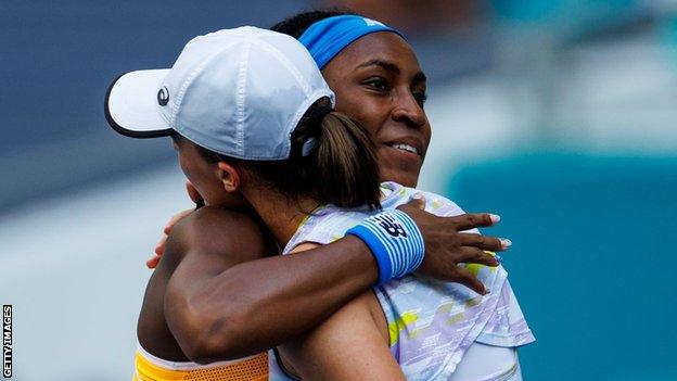 Coco Gauff and Iga Swiatek embrace after their recent Miami Open match