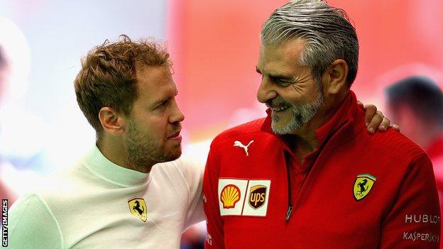 Ferrari boss Maurizio Arrivabene (right) and driver Sebastian Vettel