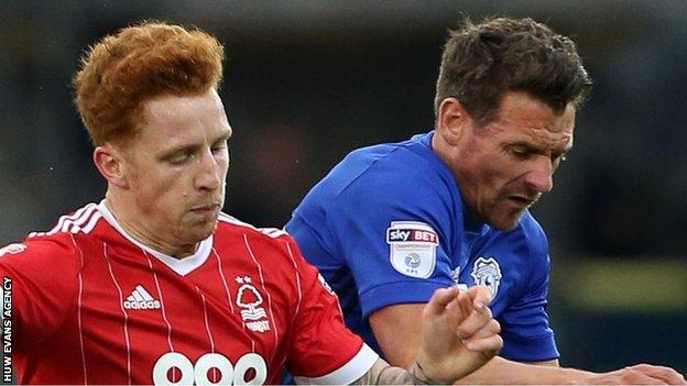 Jack Colback of Nottingham Forest is challenged by Cardiff City's Craig Bryson