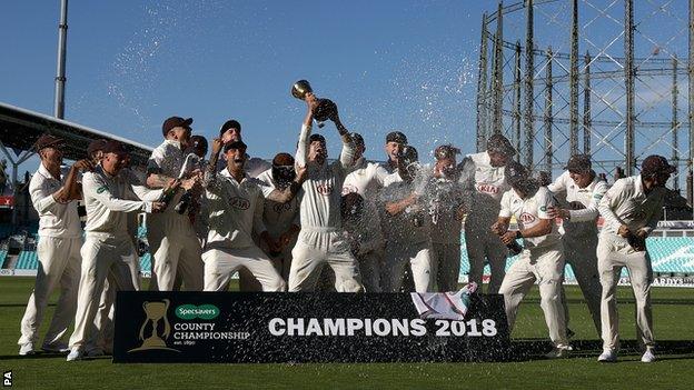 Surrey with the County Championship trophy