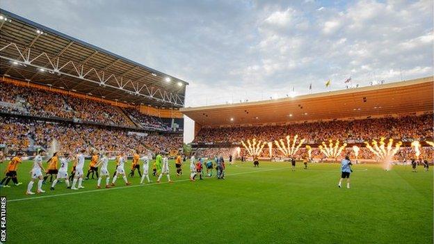 Players from Wolves and Crusaders walk out on the pitch before the Europa League second qualifying round first leg tie at Molineux