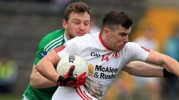 Fermanagh's Aidan Breen challenges Tyrone's Connor McAliskey at Clones