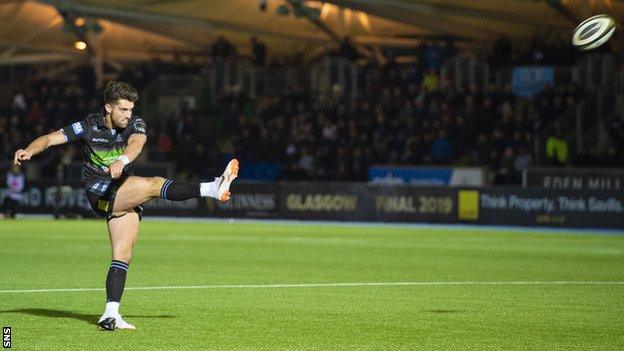 Adam Hastings takes a kick for Glasgow