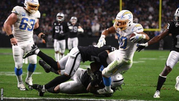 Austin Ekeler scores a touchdown for the Los Angeles Chargers