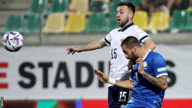 Conor McMenamin battles with Cyprus' Chambos Kyriakou after being introduced in Larnaca