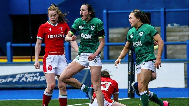 Hannah Tyrrell (centre) celebrates scoring Ireland's seventh try