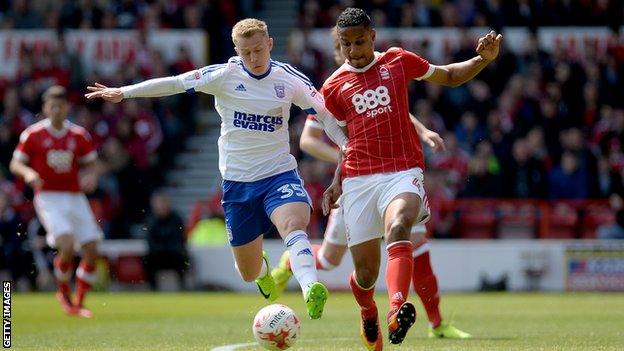 Ipswich Town winger Danny Rowe battles for the ball with Nottingham Forest's Michael Mancienne