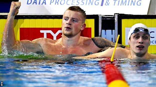 Britain's Adam Peaty celebrates.