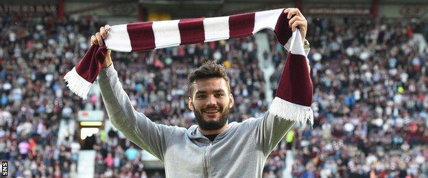 Hearts have signed Tony Watt on a season-long loan from Charlton