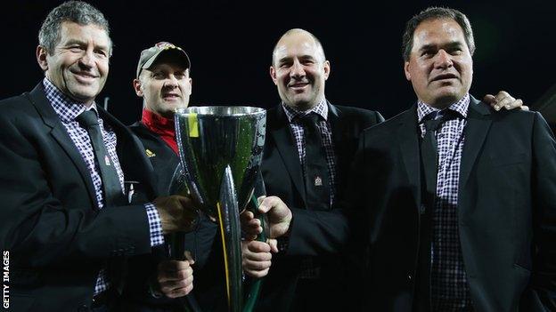 Chiefs coaching staff celebrate winning the Super Rugby title in 2013