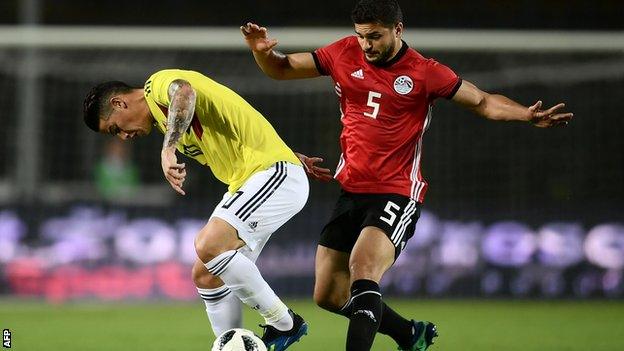 Colombia forward James Rodriguez vies for the ball with Egypt's Sam Morsy