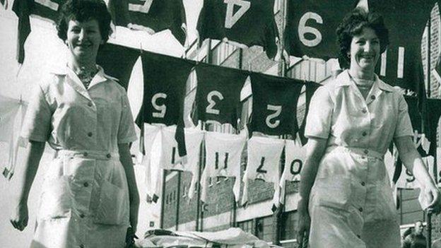 Ken Ramsden's mum and aunty hanging shirts outside Old Trafford