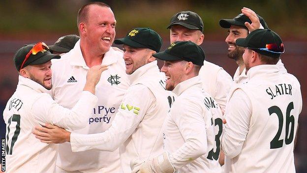 Luke Fletcher (second left) celebrates a wicket with his Nottinghamshire team-mates