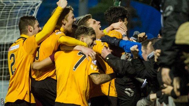 Annan players celebrate a famous Scottish Cup upset against Hamilton