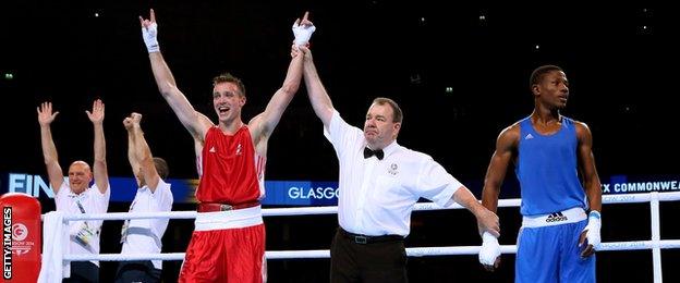 Josh Taylor wins Commonwealth Games gold in Glasgow in 2014 with victory over Junias Jonas of Namibia in the 64kg category