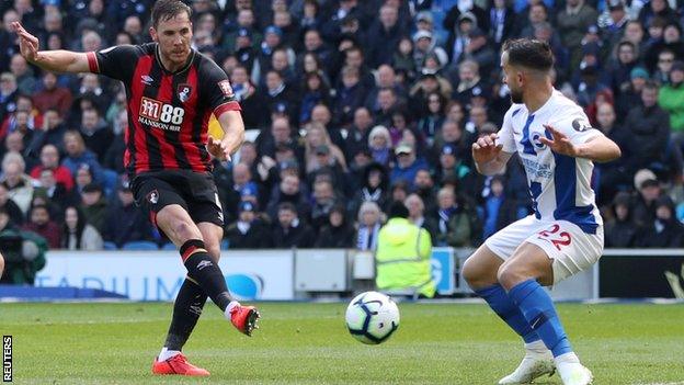 Dan Gosling of Bournemouth scores against Brighton