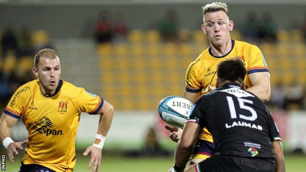 Craig Gilroy delivers a pass for Will Addison to score Ulster's third try in Parma