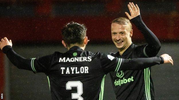 Celtic striker Leigh Griffiths (right) celebrates