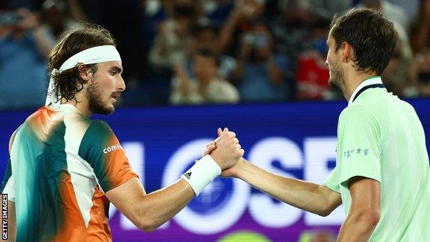 Stefanos Tsitsipas and Daniil Medvedev shake hands after Australian Open match