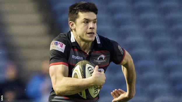 Blair Kinghorn runs with the ball for Edinburgh