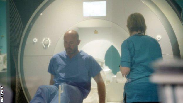 Alan Shearer exits the MRI scanner at the Queen Elizabeth University Hospital