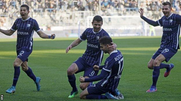 Gerrit Holtmann celebrates giving Bochum a 4-1 lead against Bayern Munich