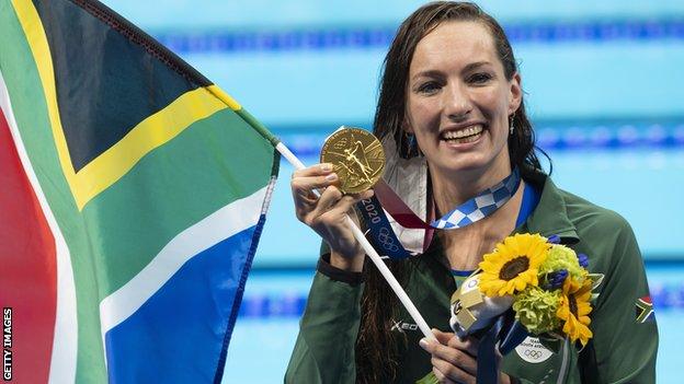 Tatjana Schoenmaker celebrates with her gold medal at the Tokyo Olympics