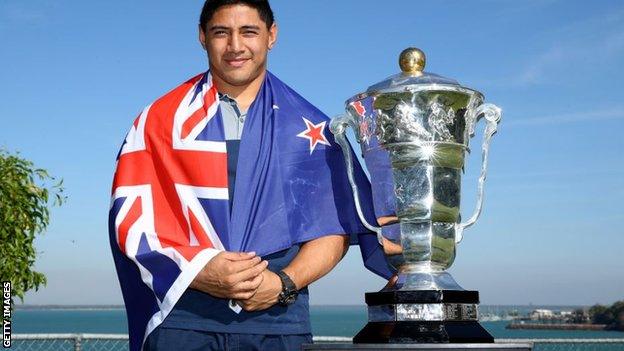 Jason Taumalolo draped in the Kiwi flag