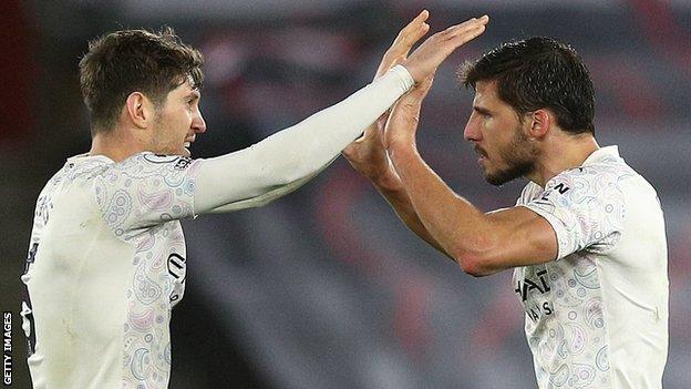 John Stones and Ruben Dias