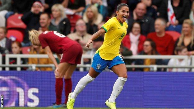 Debinha celebrates scoring for Brazil against England